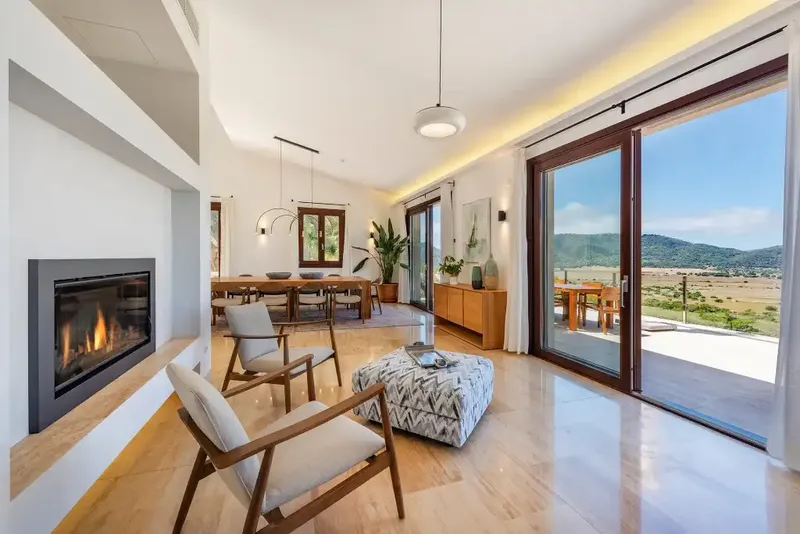 This spacious detached villa for sale in Canyamel is beautifully presented in a chic contemporary style with high ceilings — photo 4