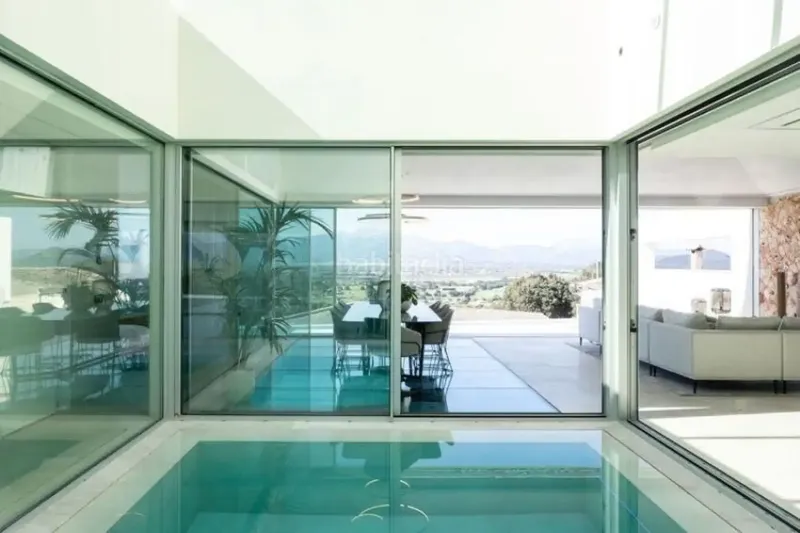 Welcome to your new luxury home! This detached villa offers everything your heart desires: from a heated indoor pool — photo 5