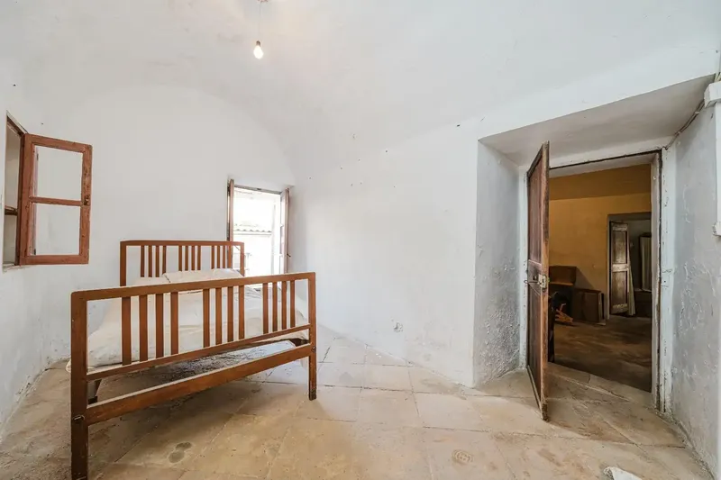 This house for renovation is located in Sant Llorenç, in an area with year-round activity in Mallorca. From gestpropiedad, real estate — photo 12
