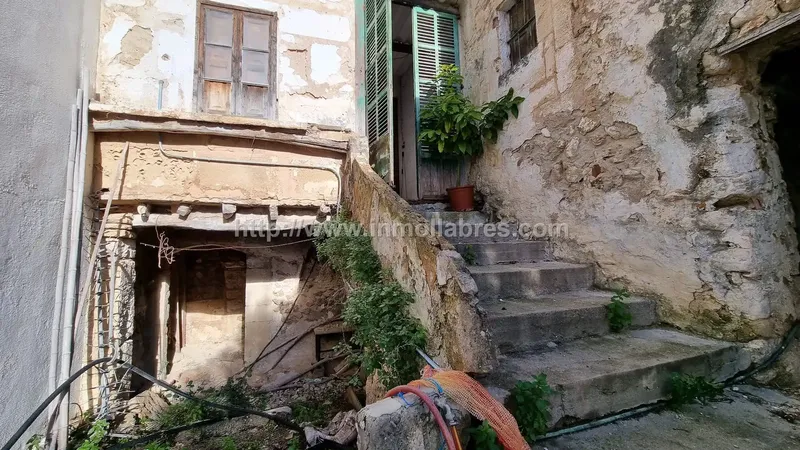 Encantadora casa de pueblo situada en el pintoresco pueblo de Campanet, en las Islas Baleares. Esta vivienda, construida en el año 1900, ofr — photo 12