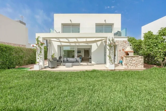 Modern three-bedroom coastal villa with sun-drenched terraces for sale in Sa Ràpita — photo 1