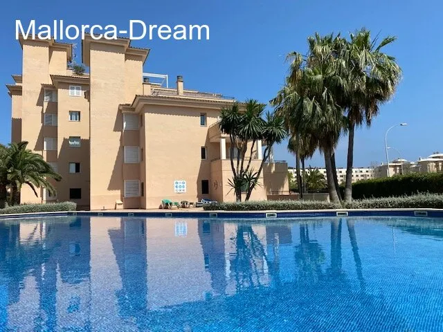 Sa Coma: Modernized ground floor apartment with approx. 60 m² terraces, fantastic pool area, underground parking space & storage room — photo 1