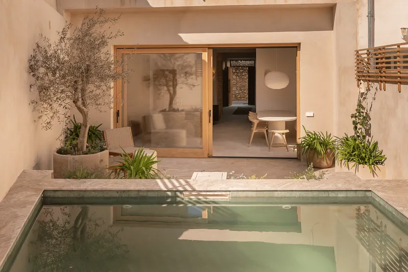 Exquisitely renovated traditional village house in Alaro with pool — photo 1