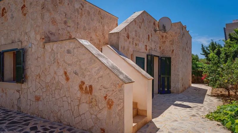 Natural stone chalet in Cap des Moro – with roof terrace and sea views — photo 7