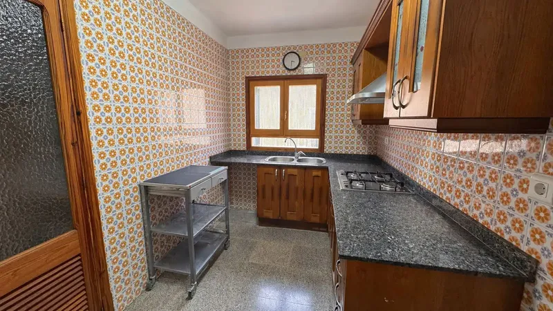 This building of 4 homes in Colonia Sant Jordi, distributed in 2 apartments on the ground floor, 2 apartments on the first floor, and a semi-basement with patio — photo 3