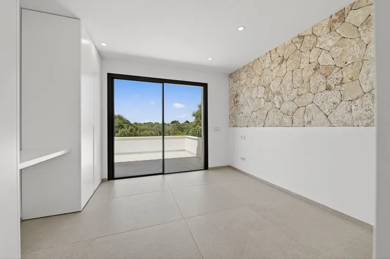Modern new build villa with sea view roof terrace in Cala Llombards — photo 11