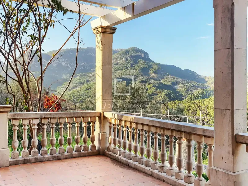 Discover your dream refuge in the serene mountains overlooking the port of Sóller. This magnificent country house is situated on a hillside — photo 1