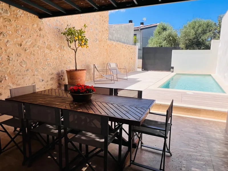 Maria de la Salut: Beautifully renovated townhouse with pool — photo 1