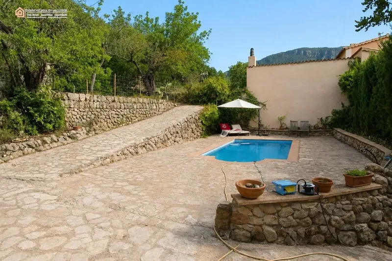 In a privileged natural setting in Bunyola, surrounded by Mediterranean vegetation and mountains, we present this unique single-family home — photo 6