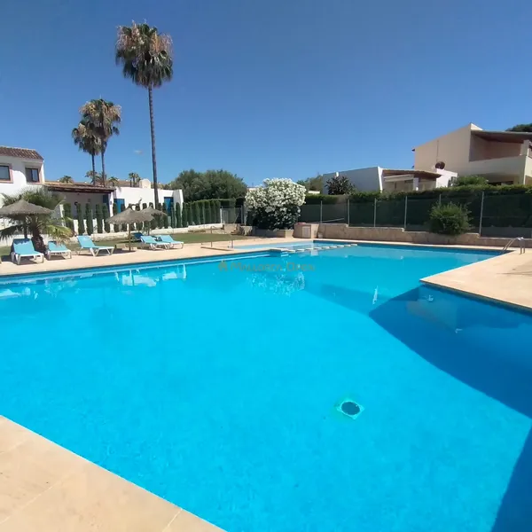 Ground floor with private garden and communal pool in Cala Mandia — photo 3