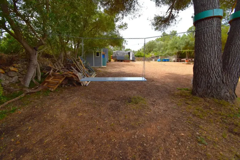 Rustic plot of approximately 2,128 m² for sale in Petra, just 1.5 km from the town center. — photo 1