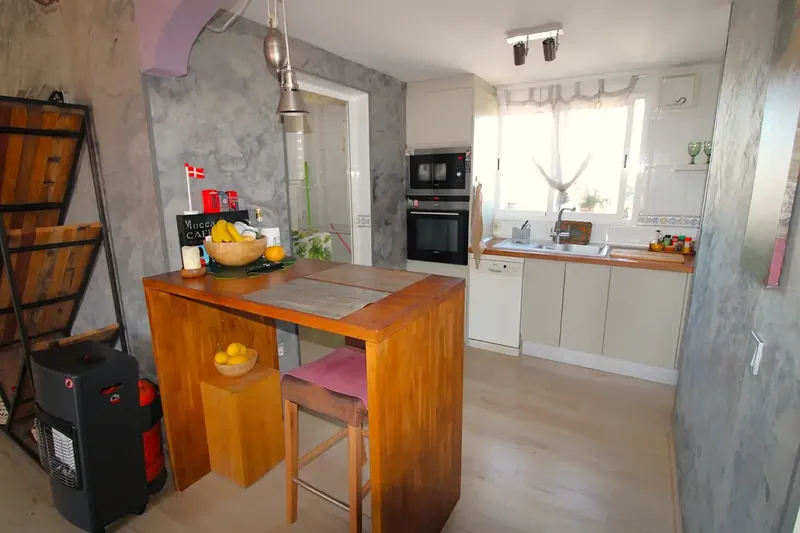 Fantastic duplex penthouse for sale in Maioris. It consists of living-dining room, equipped American kitchen and laundry room, and access to terrace with views — photo 7
