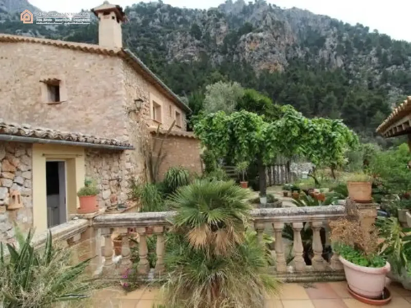 This beautiful stone house is located in Biniaraix, one of the most beautiful and picturesque villages in Spain. — photo 1