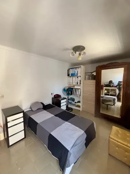 House located in the old town of Alcudia. On the ground floor there is a double bedroom, living-dining room and kitchen. And then a — photo 12