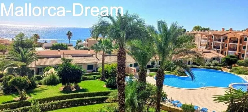 Porto Cristo Novo: Top sea view flat with balcony + roof terrace + pool, palm garden + own parking space — photo 1