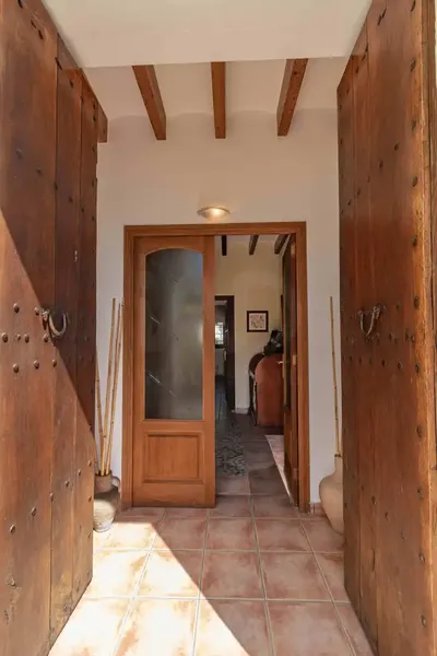 Located in the charming village of Es Capdellà, this village house offers exceptional quality of life in one of the most authentic corners — photo 1