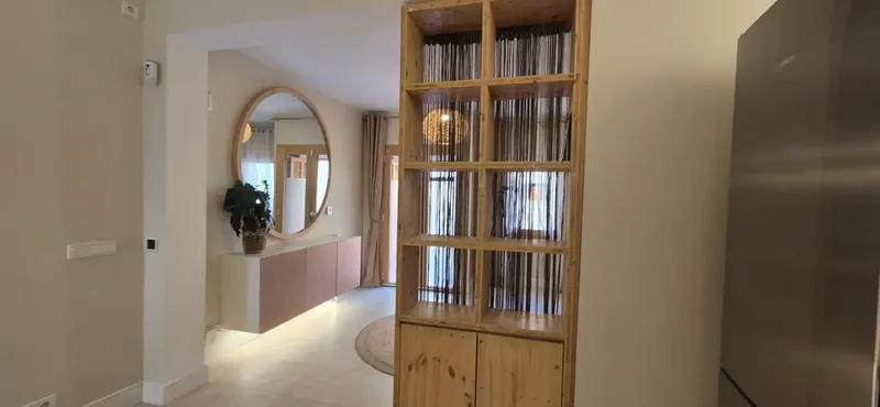 On a quiet street and just a minute's walk from the central square, this home offers the perfect balance of privacy, comfort — photo 4