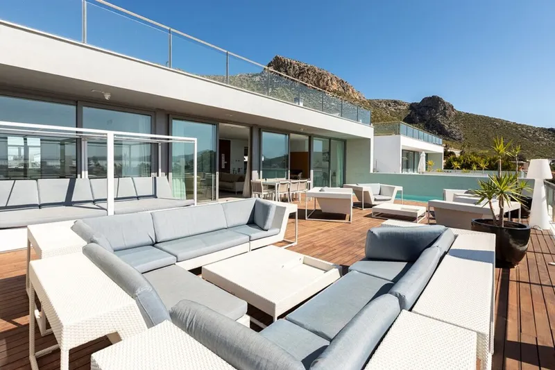 Modern coastal villa with panoramic bay views in Puerto Pollensa — photo 1
