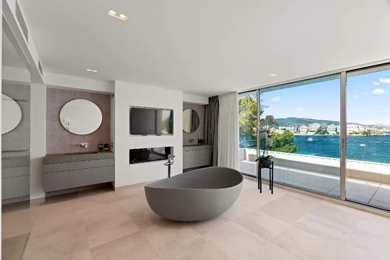 Exquisitely renovated frontline designer villa in Cala Vinyas—private beach access, pool, spa, and elevator — photo 8