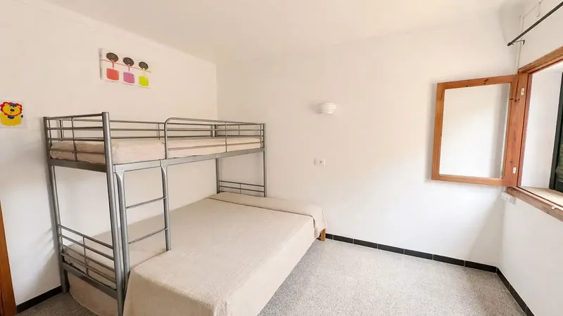 This building of 4 homes in Colonia Sant Jordi, distributed in 2 apartments on the ground floor, 2 apartments on the first floor, and a semi-basement with patio — photo 6