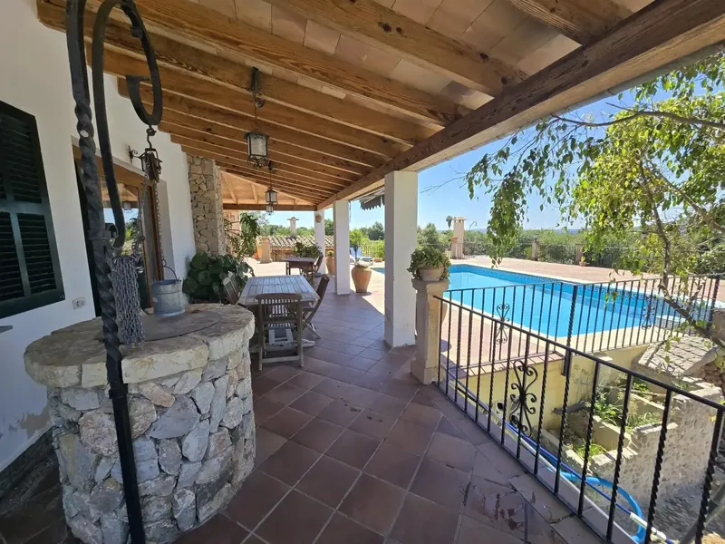 Discover this impressive chalet located in the idyllic town of Campanet, where comfort meets an exceptional natural environment. With a — photo 2