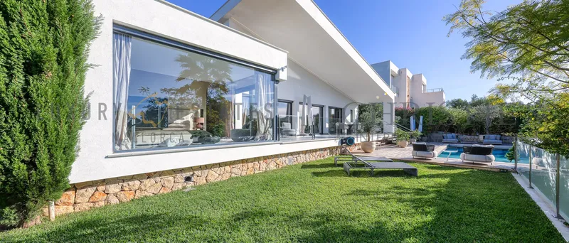 Modern bungalow-style villa in Cala Vinyas with pool and garden — photo 1
