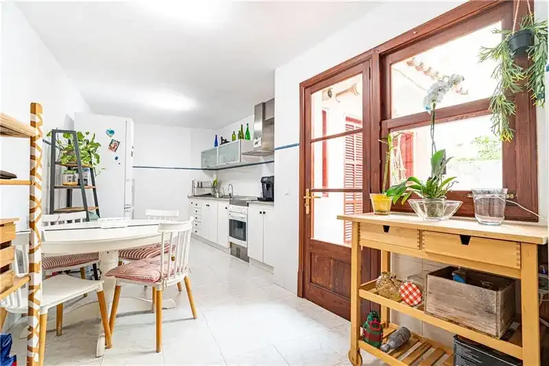 Townhouse in Selva, a home of approximately 176 m2 built, distributed over two floors. On the ground floor we find a living room — photo 3