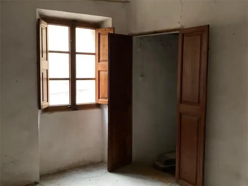 Casa de pueblo en el centro de Arta, con paredes de piedra y vigas de madera, con mucho carácter y encanto (anterior al año 1890). — photo 7