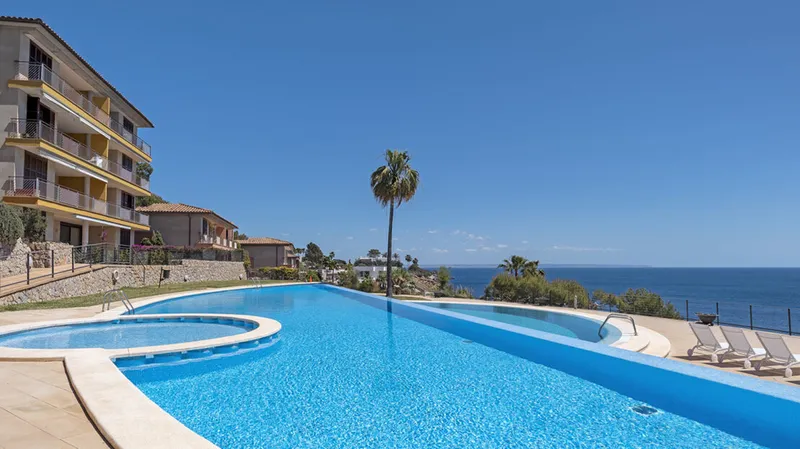 Superb and luxurious, south facing apartment in a first line waterfront community affording panoramic sea and coastal views in Sol de Mallorca – For Sale — photo 1