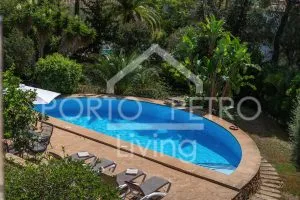 Ref. PRO227 – Unique villa with impressive architecture, spacious plot, paradisiacal garden with various terrace areas, garage, carport and large pool centrally located in Porto Petro — photo 8
