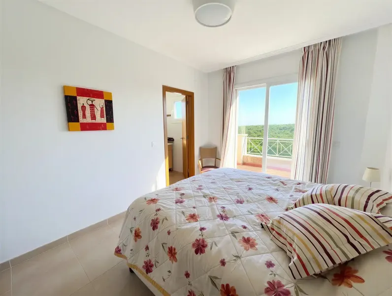 Located in the quiet and natural surroundings of Cales de Mallorca, this cozy penthouse offers a relaxed Mediterranean lifestyle with ample — photo 12