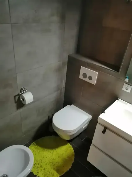 This is a completely renovated ground-floor property in very good condition. It is located in Port Adriano, accessed via the slope — photo 9