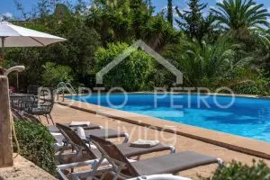 Ref. PRO227 – Unique villa with impressive architecture, spacious plot, paradisiacal garden with various terrace areas, garage, carport and large pool centrally located in Porto Petro — photo 9