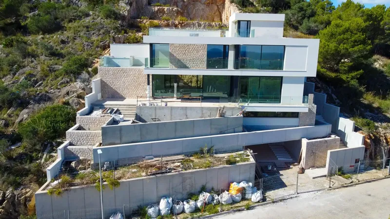 For sale this modern chalet under construction, near completion, of a unique style, with impressive sea and mountain views — photo 4