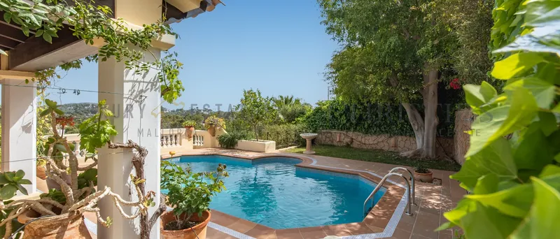 Mediterranean-style villa in Costa de la Calma with partial ocean views — photo 1