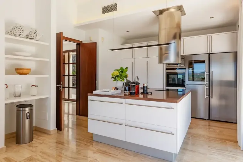 This spacious detached villa for sale in Canyamel is beautifully presented in a chic contemporary style with high ceilings — photo 7