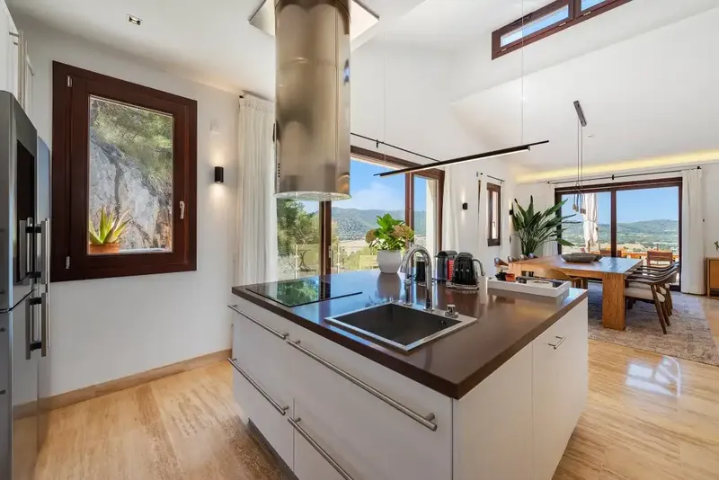 This spacious detached villa for sale in Canyamel is beautifully presented in a chic contemporary style with high ceilings — photo 8