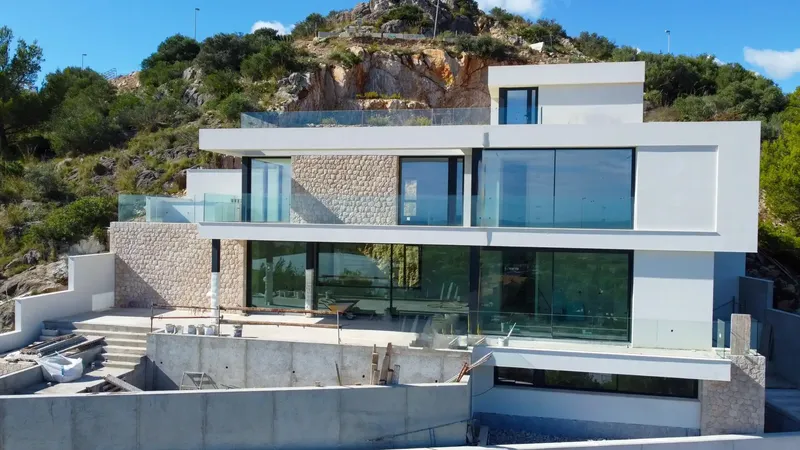 For sale this modern chalet under construction, near completion, of a unique style, with impressive sea and mountain views — photo 11