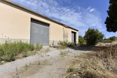 Urban plot 1808 sqm with storage center — photo 1